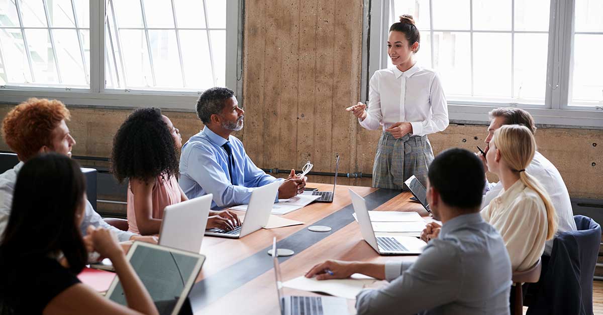 business meeting led by female exective