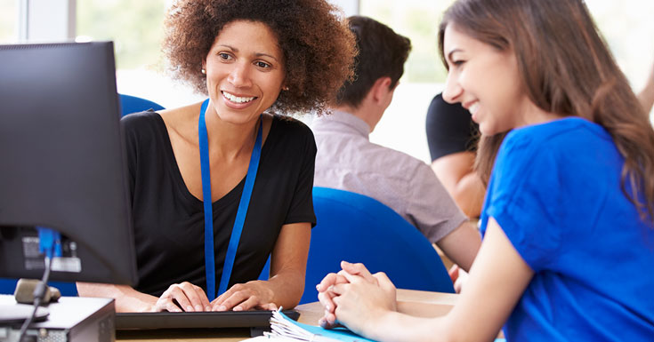 female college student meeting with an advisor