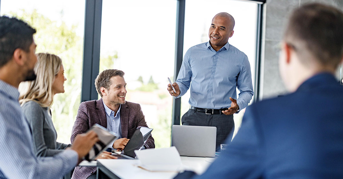 black businessman talking to colleagues during a meeting