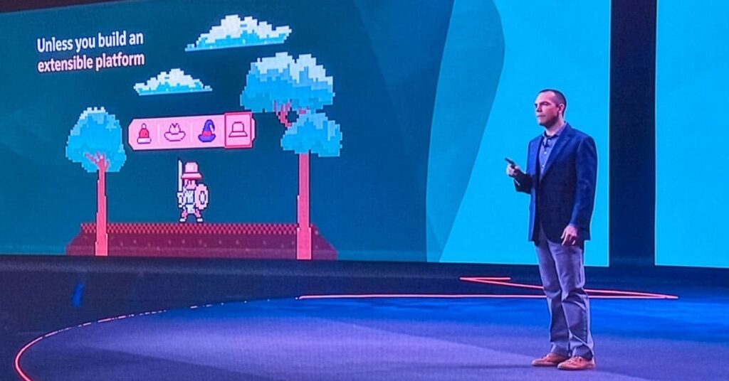 Oracle co-CEO Clay Magouyrk on stage presenting at AI World 2025