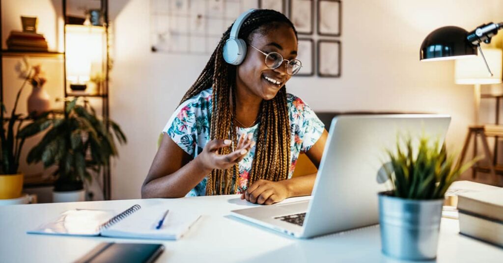 African American female college student studying online from home